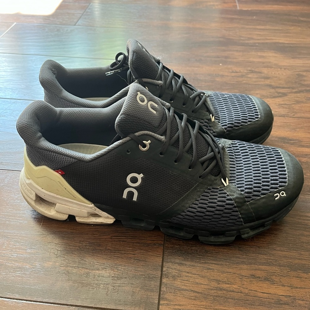 On Running Black and White Athletic Shoes with Mesh Upper